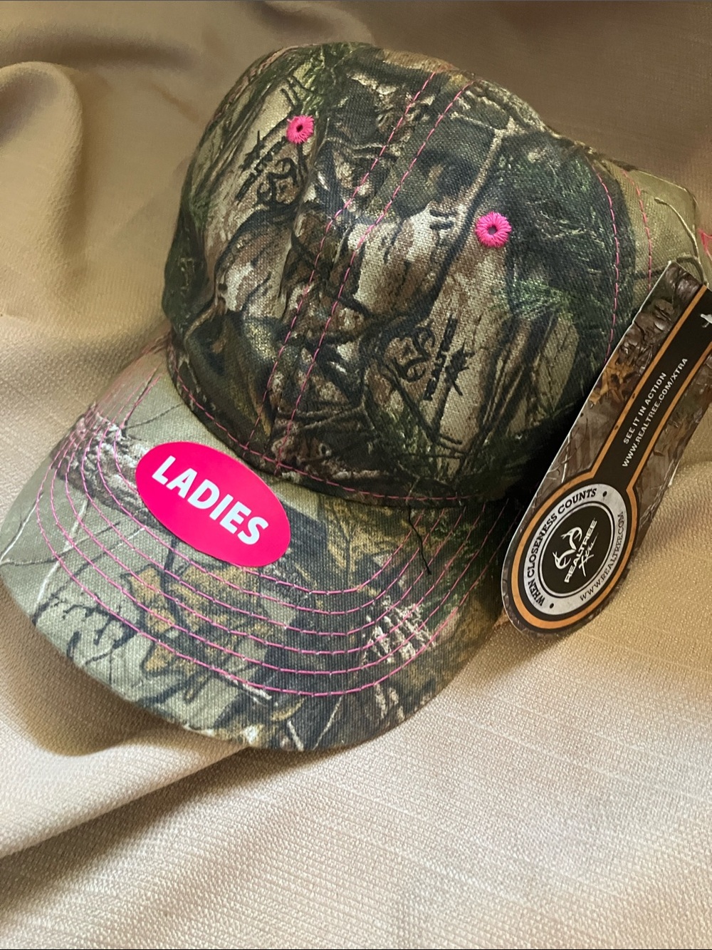 Realtree Women's Camo Baseball Cap with Pink Stitching and Eyelets